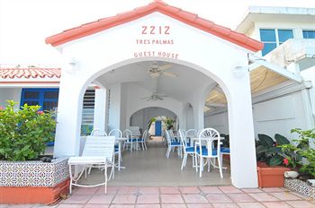 Tres Palmas Inn